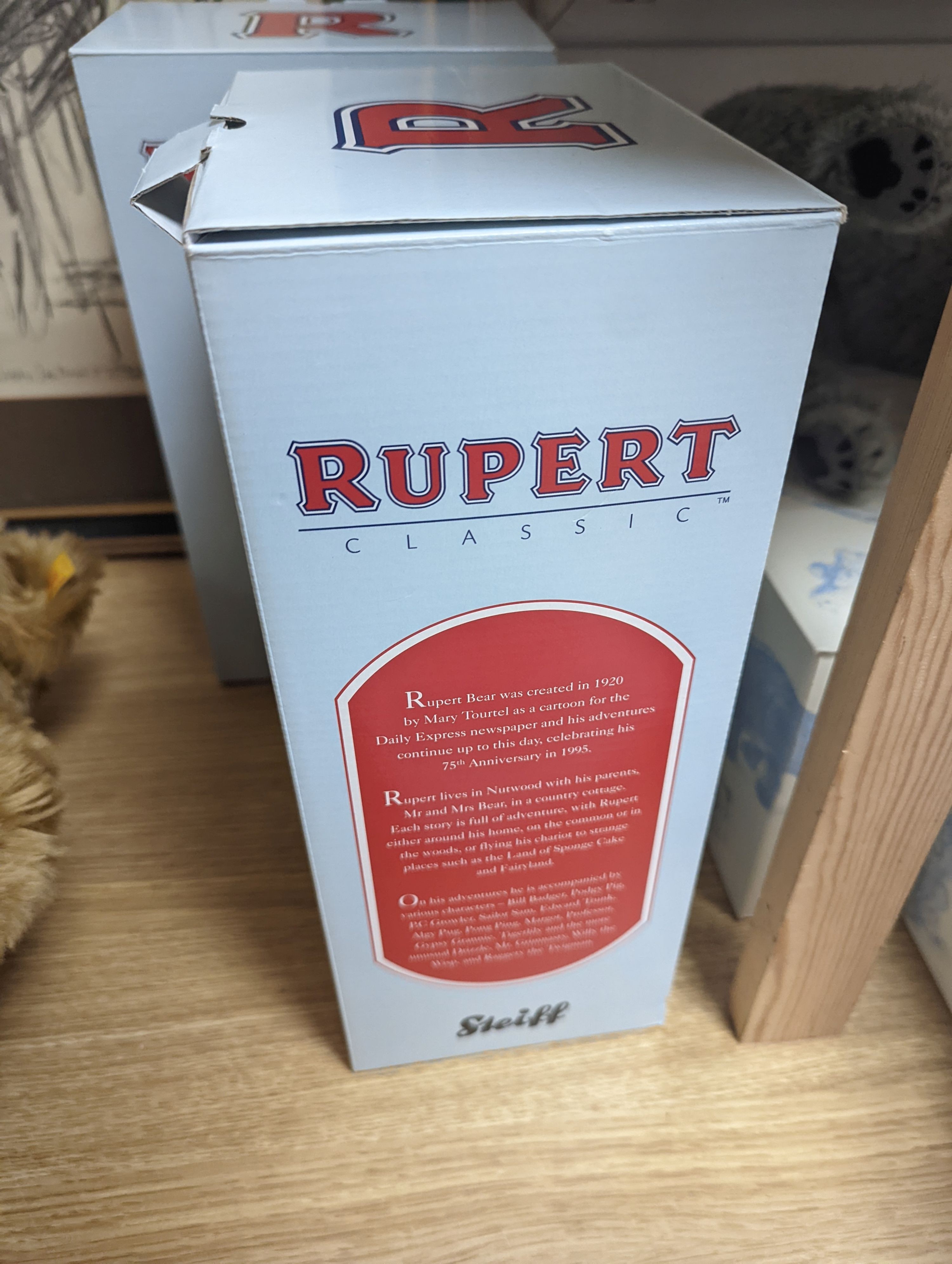 Steiff Classic 1903 bear with Steiff Limited Edition 'Algy' Pug from Rupert Series with Steiff Limited Edition 'Bill the Badger', Rupert Series both with box and certificate, bear 47 cms high.